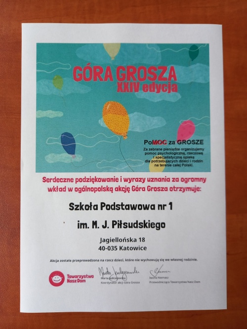 Dyplom z akcji zbierania groszy